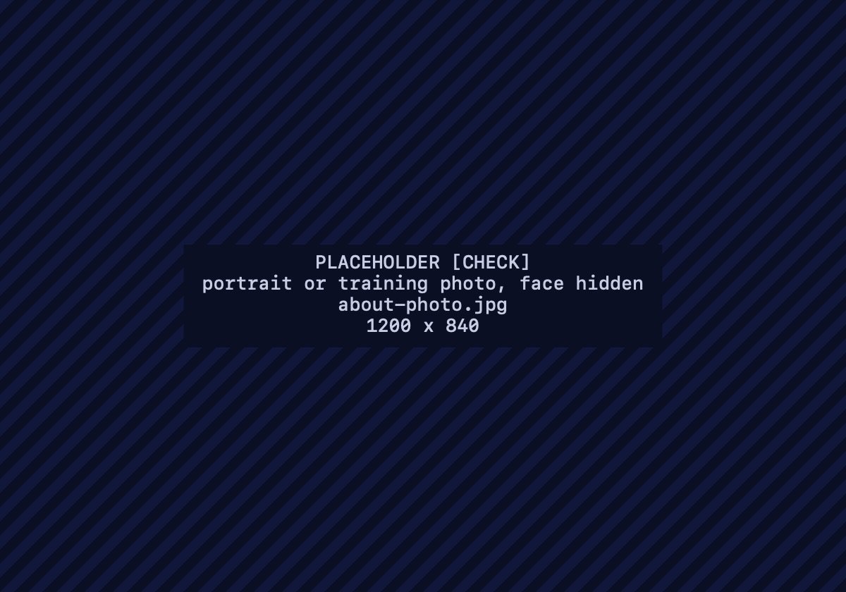 Placeholder for a portrait or training photo, face hidden
